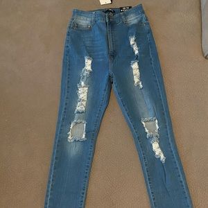 light blue ripped skinny jeans